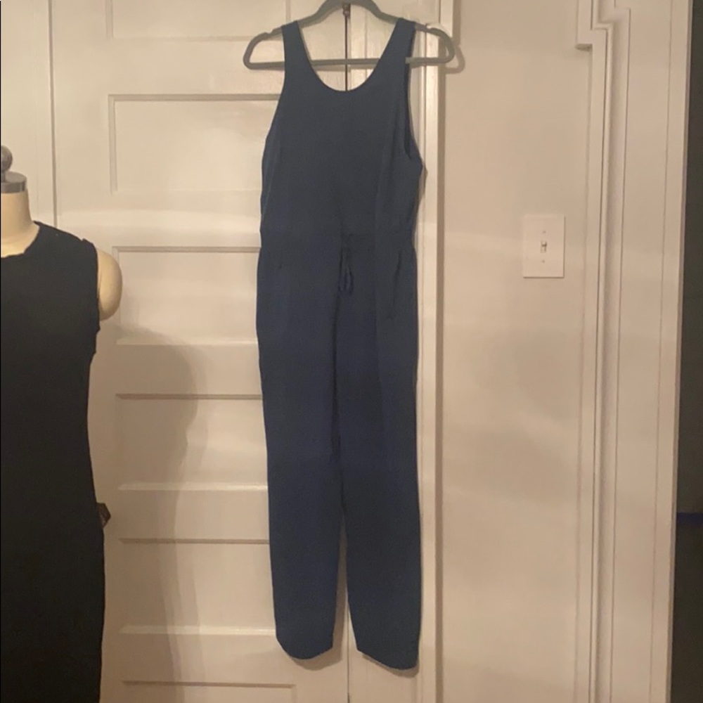Blue jumpsuit high low tapered ankle